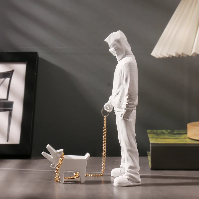 Sculpture homme et chien